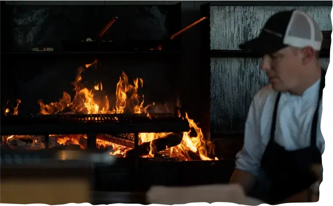 chef grilling at Forge & Vine